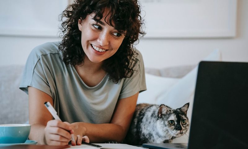 woman paying off credit card online